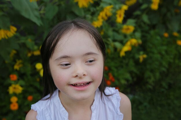 Portrait of little girl smiling in the garden