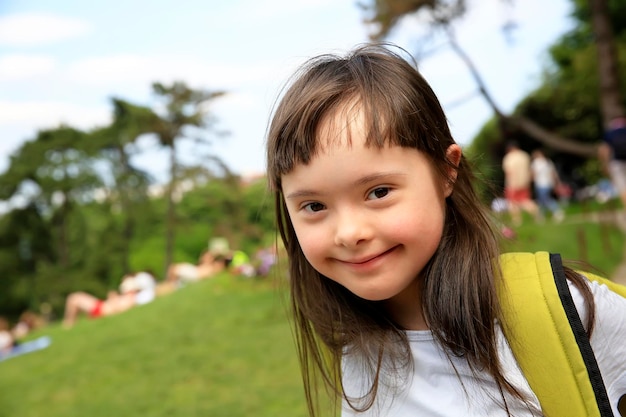 Portrait of little girl smiling in the park