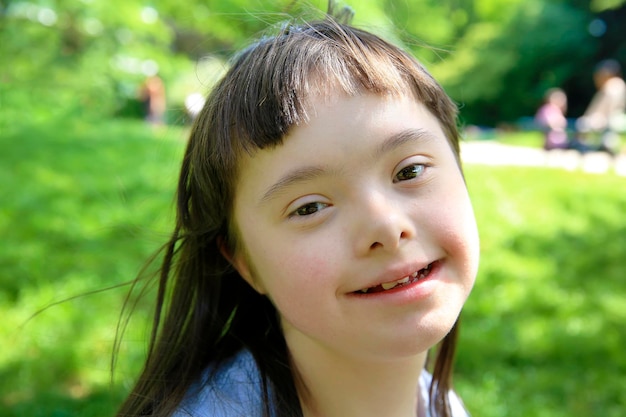 Portrait of little girl smiling in the park