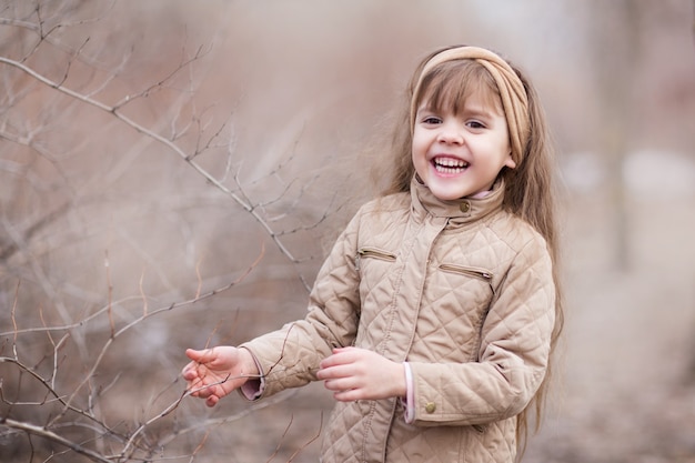 portrait of a little girl in the spring