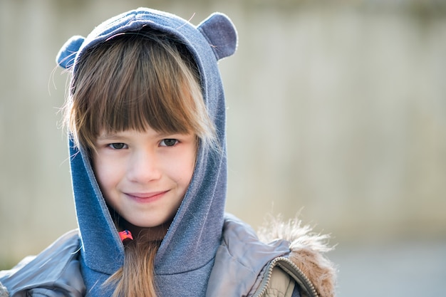 portrait of a little girl with bangs