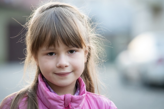 portrait of a little girl with bangs