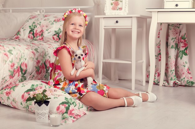 Portrait of little girl with flower wreath