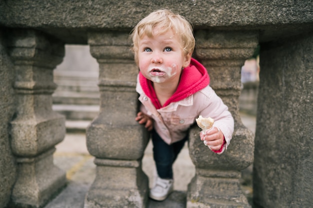 Portrait of little girl with ice cream