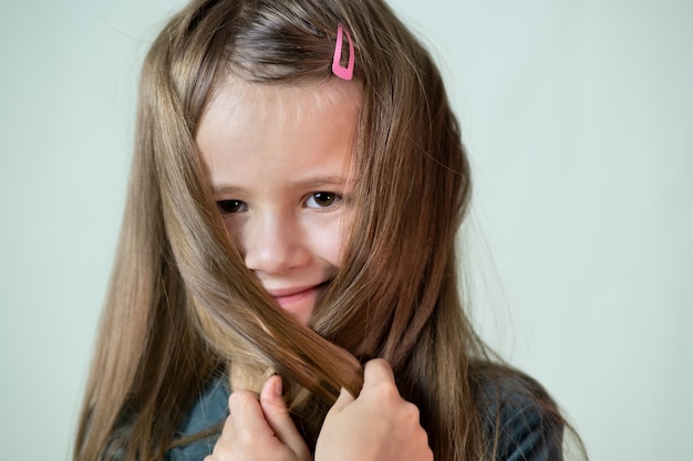 portrait of little girl with long hair.