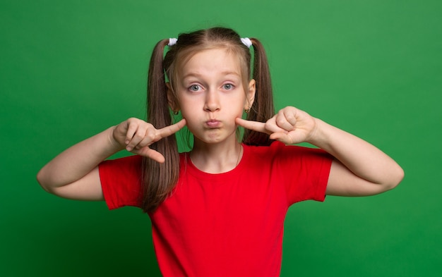 Portrait of a little girl with pigtails