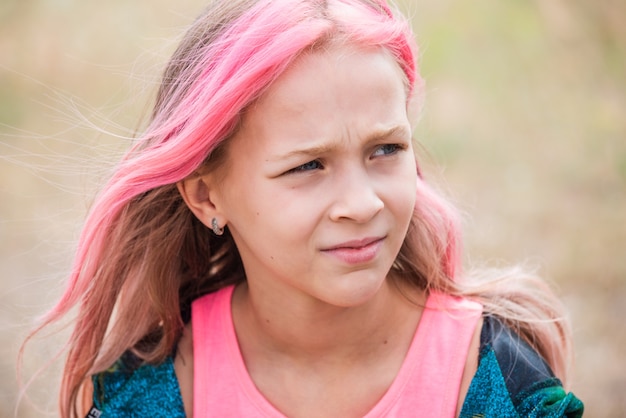 portrait little girl with pink hair