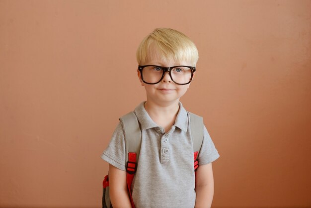 Photo portrait of a little schoolboy