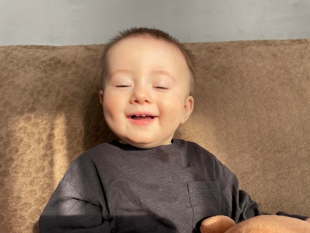 Portrait of a little tenmonthold boy smiling