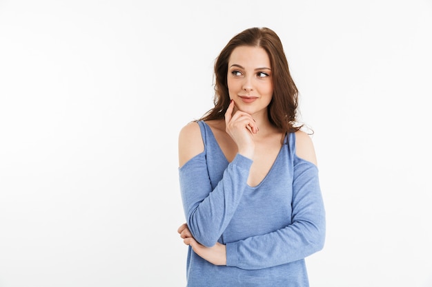 Portrait of a lovely young woman looking away