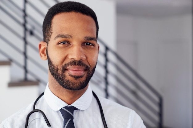 Portrait Of Male Doctor With Stethoscope In Hospital