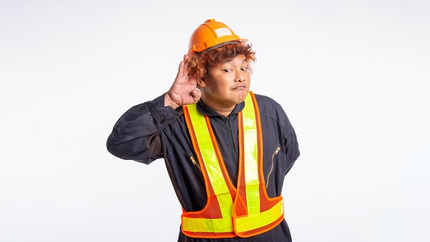 Photo portrait male laborer wearing a safety suit wearing a helmet reflective safety vest