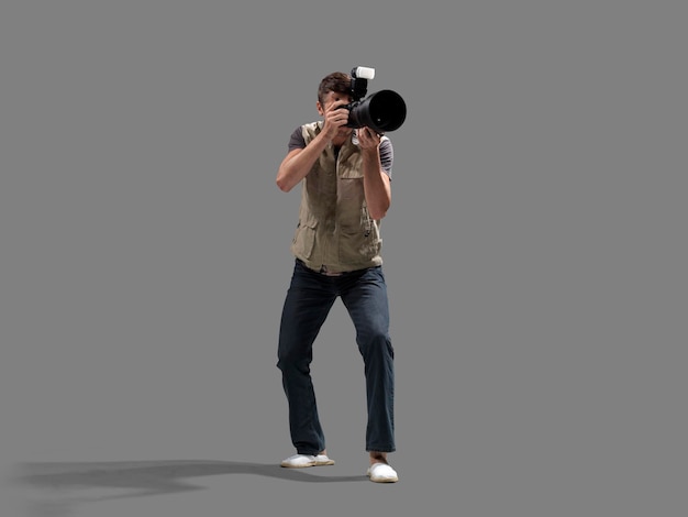 Portrait of male photographer with professional cameras isolated on grey background