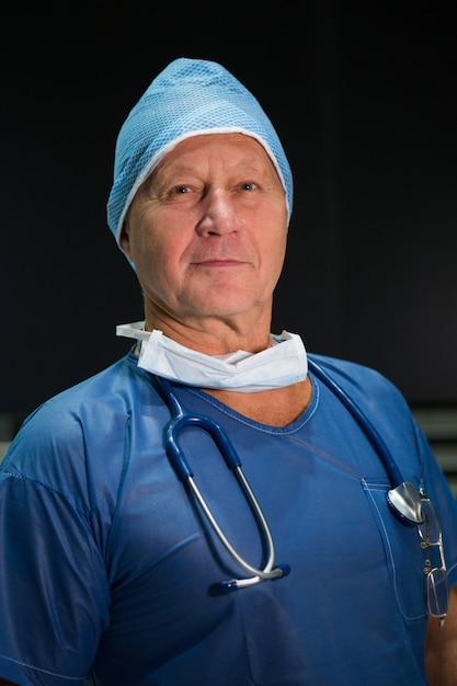 Portrait of male surgeon in scrubs