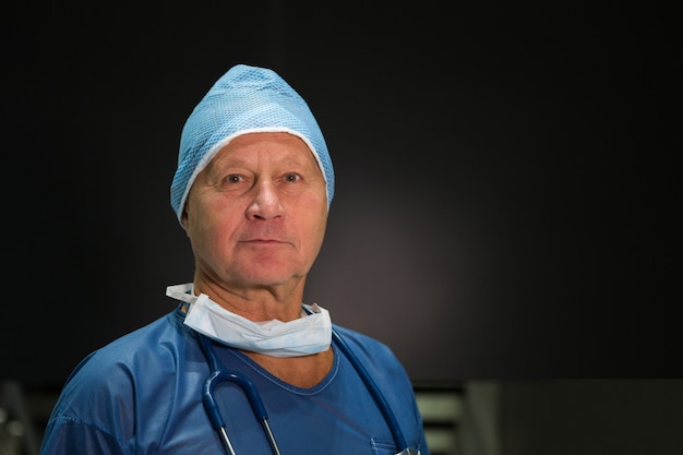 Portrait of male surgeon in scrubs