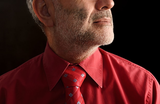 Portrait of a man on black background