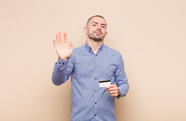 portrait of a man on a cream background