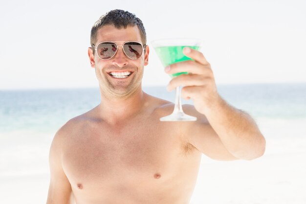 Portrait of man drinking cocktail