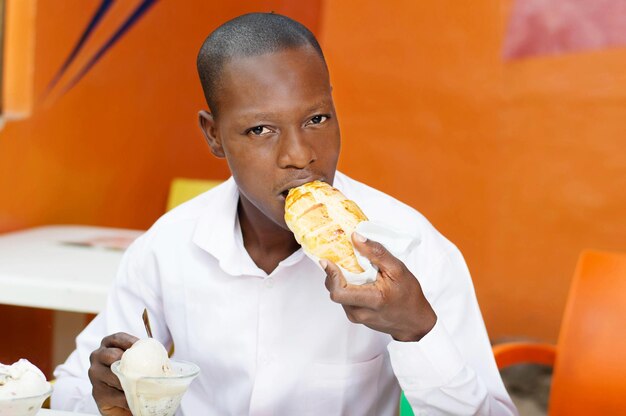 Portrait of man eating food