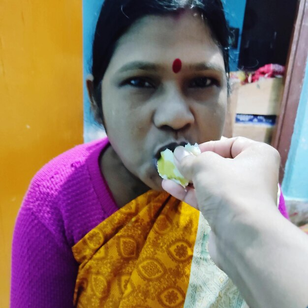 Portrait of man eating food