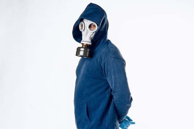 Portrait of a man in a gas mask. Panic during quarantine. Coronavirus pandemia concept