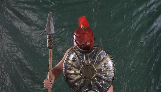 Photo portrait of a man in a gladiator costume