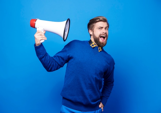 Portrait of man holding a megaphone