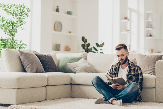 portrait man at home reading