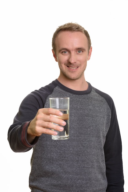 Portrait of man isolated against white wall