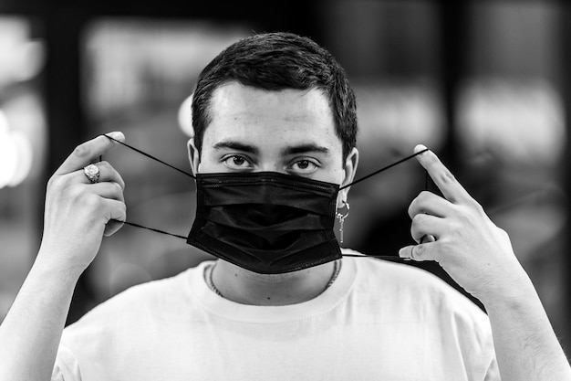 Portrait of a man in a mask from a virus epidemic protection