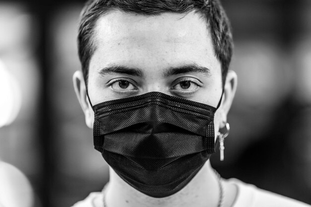 Portrait of a man in a mask from a virus epidemic protection