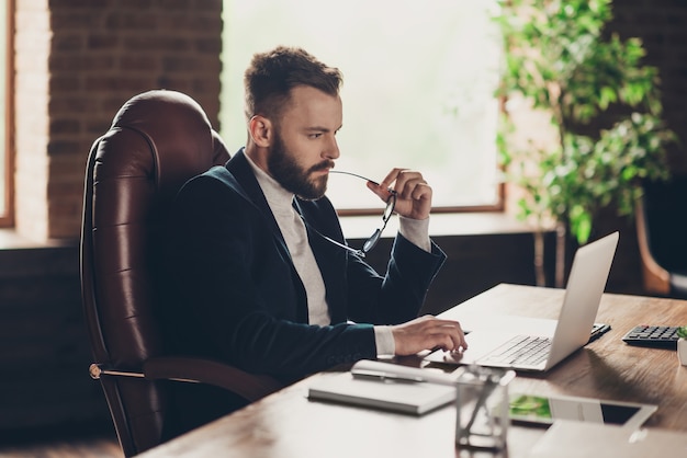 portrait man at office working