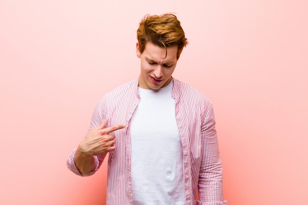 portrait of a man on a pink background