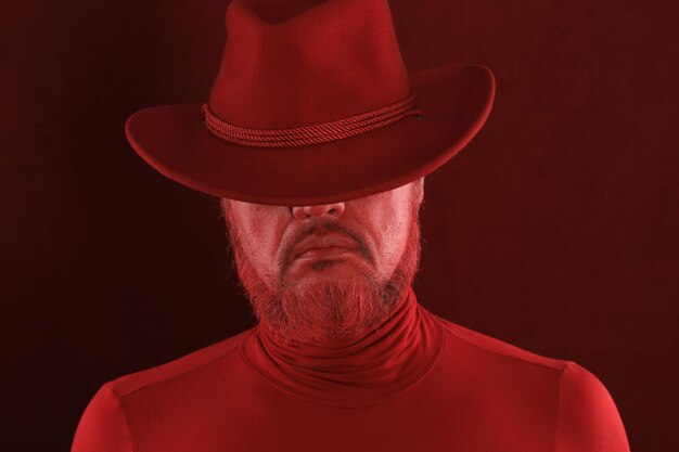 portrait of a man in a red hat