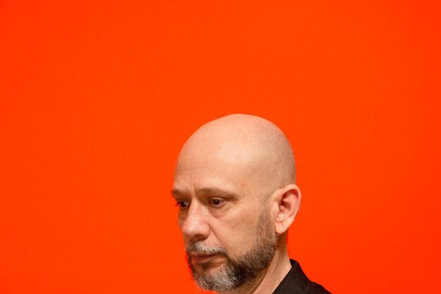 Portrait of a man's head bald and bearded