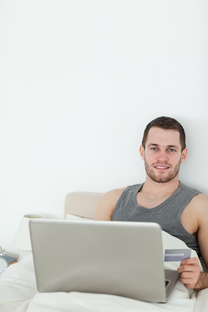 Portrait of a man shopping online