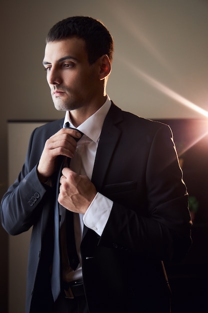 Portrait of a man in a suit and tie