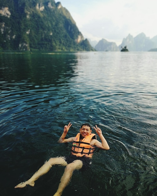 Portrait of man swimming in sea