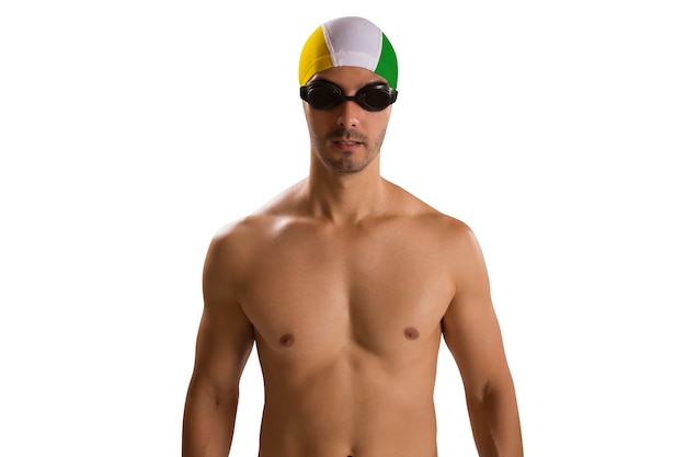 Portrait of man in swimsuit; professional swimmer over white space with Brazilian uniform.