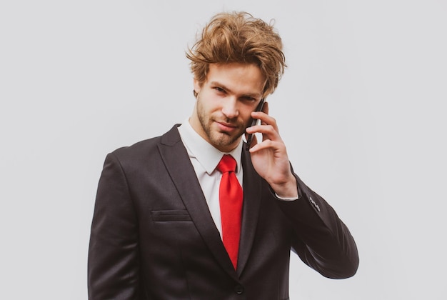 Portrait of man talking on the phone isolated