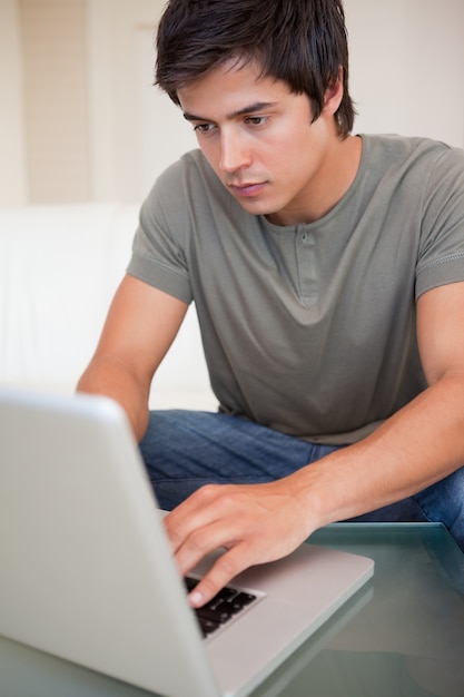 Portrait of a man using a laptop