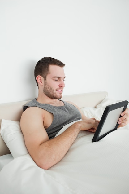 Portrait of a man using a tablet computer