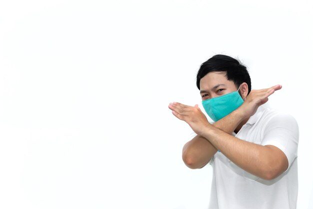 Portrait of man wear protect mask on white backgroundWearing face mask for prevent COVID19 Pandemic Coronavirusworker with medical mask for against and stop coronavirus