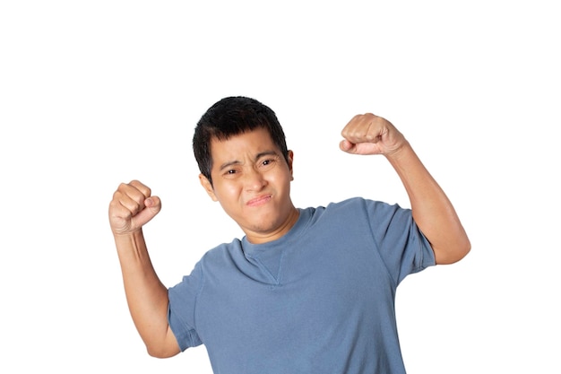 Portrait man wearing casual blue shirt posing show arms muscles isolated on white background Showing biceps muscles strong studio portrait fitness and lifestyle concept