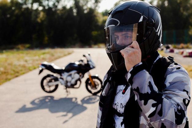 Portrait of man wearing helmet