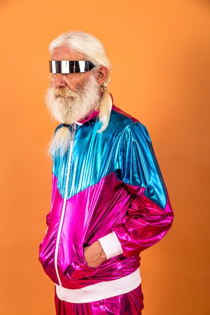 Portrait of man wearing mask against gray background