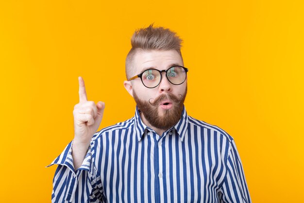 Portrait of man wearing mask against yellow background