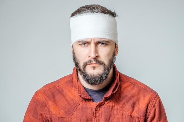 Portrait of man with bandage