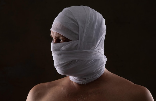 portrait of a man with a bandaged head