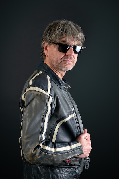 Portrait of a man with leather biker jacket